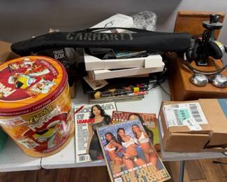 Carhartt case. Collectible magazines. Antique phine.