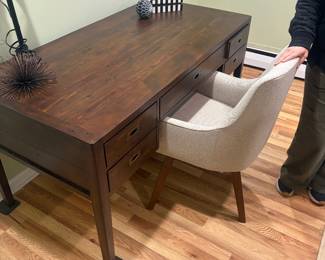 Desk with upholstered chair