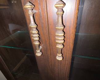 H41 - $100. Glass front gun cabinet with glass shelves added for display cabinet. Measures 31.5" x 12" x 70.5"T. No key.