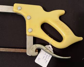 H57 - $30. Southern Saw Service bone saw. Measures 32" long.