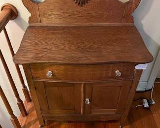 H13 - $95. Antique Oak Washstand with a High-Back Harp frame. Measures 29.5" x 17" x 73"T, floor to dresser top- 29.25"T. Very good condition.