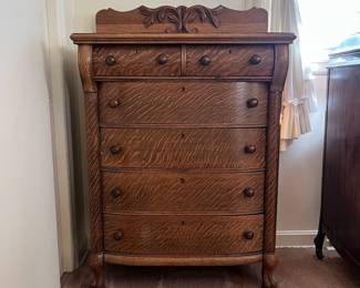 H16 - $125. Antique Tiger Oak Highboy Dresser. Measures 36" x 20" x 54.5"T. Overall good condition, top has some splitting as shown in photo.