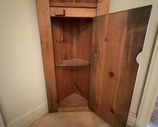 H27 - $75. Small Pine Corner Cabinet. Measures 17" x 9" x 72"T.