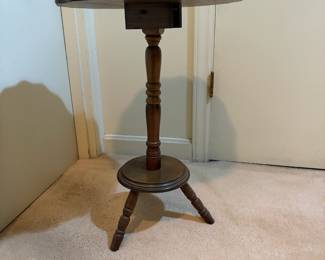 H39 - $45. Tilt top pie crust table. Measures 17" x 25"T.