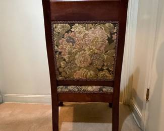 H30 - $50. Wood carved chair with floral upholstery. Measures 21.5" x 22" x 38.75"T, floor to seat 17"T.