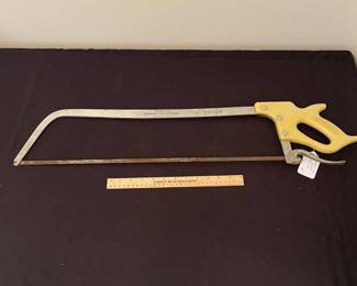 H57 - $30. Southern Saw Service bone saw. Measures 32" long.