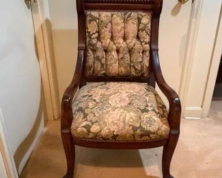 H30 - $50. Wood carved chair with floral upholstery. Measures 21.5" x 22" x 38.75"T, floor to seat 17"T.