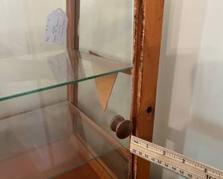 H50 - $450. Tom's toasted peanuts countertop display cabinet. Measures 24" x 12" x 16" tall. One top corner has cracked glass but it's still in the case.