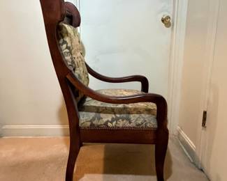 H30 - $50. Wood carved chair with floral upholstery. Measures 21.5" x 22" x 38.75"T, floor to seat 17"T.