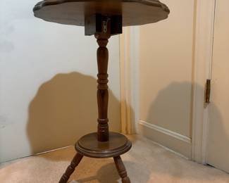 H39 - $45. Tilt top pie crust table. Measures 17" x 25"T.