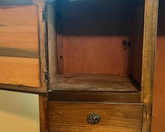 H19 - $50. Wardrobe with cabinet, 5 drawers, and clothes bar. Measures 37.25" x 16.5" x 66"T. Some surface wear and a sticker on the mirror, but overall good condition.