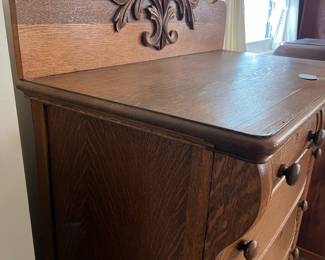 H16 - $125. Antique Tiger Oak Highboy Dresser. Measures 36" x 20" x 54.5"T. Overall good condition, top has some splitting as shown in photo.