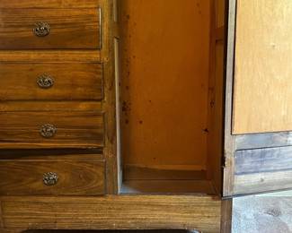 H19 - $50. Wardrobe with cabinet, 5 drawers, and clothes bar. Measures 37.25" x 16.5" x 66"T. Some surface wear and a sticker on the mirror, but overall good condition.