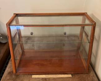 H50 - $450. Tom's toasted peanuts countertop display cabinet. Measures 24" x 12" x 16" tall. One top corner has cracked glass but it's still in the case.