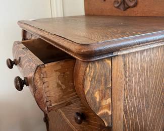 H16 - $125. Antique Tiger Oak Highboy Dresser. Measures 36" x 20" x 54.5"T. Overall good condition, top has some splitting as shown in photo.