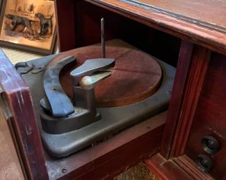 H1- $100. Emerson radio and stereo cabinet. Model 586. Measures 33.25" x 16" x 34.5"T. Surface wear. Not in working condition.