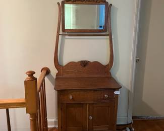 H13 - $95. Antique Oak Washstand with a High-Back Harp frame. Measures 29.5" x 17" x 73"T, floor to dresser top- 29.25"T. Very good condition.