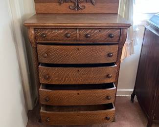 H16 - $125. Antique Tiger Oak Highboy Dresser. Measures 36" x 20" x 54.5"T. Overall good condition, top has some splitting as shown in photo.