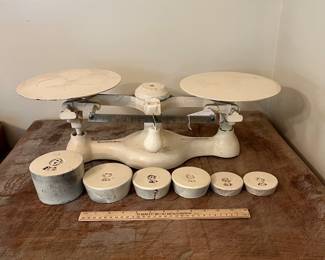 H51 - $110. Vintage Detecto No. 1 cast iron balance scale with weights.