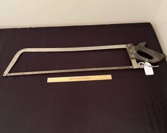 H58 - $30. Hook - Eye butcher bone saw. Measures 32" long.