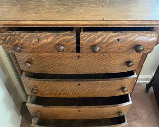 H16 - $125. Antique Tiger Oak Highboy Dresser. Measures 36" x 20" x 54.5"T. Overall good condition, top has some splitting as shown in photo.
