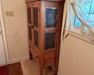 H24 - $350. Oak Pie Safe Cabinet with Punched Tin Doors. Measures 35" x 16.5" x 63"T.