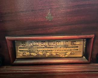H1- $100. Emerson radio and stereo cabinet. Model 586. Measures 33.25" x 16" x 34.5"T. Surface wear. Not in working condition.