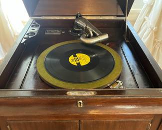 H17 - $125. Victor Victrola floor-standing wind-up phonograph cabinet. Model VV - XIV. Measures 21.5" x 22.75" x 47.25"T. Very good condition.