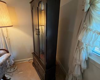 H41 - $100. Glass front gun cabinet with glass shelves added for display cabinet. Measures 31.5" x 12" x 70.5"T. No key.