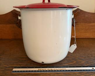 H68 - $20. Enameled pot with lid.