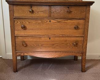 H14 - $125. Antique Oak Full Sized Dresser With Harp Mirror. Measures 38" x 19" x 66.5"T, floor to dresser top- 33.5"T. Very good condition.