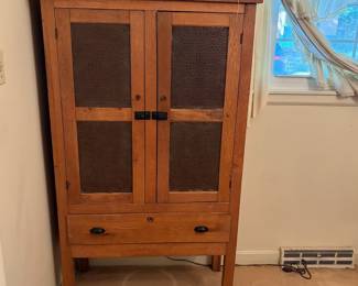 H24 - $350. Oak Pie Safe Cabinet with Punched Tin Doors. Measures 35" x 16.5" x 63"T.