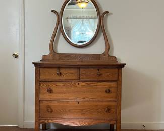 H14 - $125. Antique Oak Full Sized Dresser With Harp Mirror. Measures 38" x 19" x 66.5"T, floor to dresser top- 33.5"T. Very good condition.