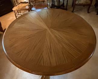H42 - $150. Clawfoot pedestal dining table with 6 chairs and leaf. Table measures 48" x 30"T, Chairs measure 17.75" x 16" x 43"T, floor to seat 18"T. Two chairs have splitting in the seat as shown in photo.