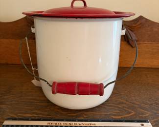 H68 - $20. Enameled pot with lid.