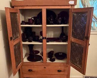 H24 - $350. Oak Pie Safe Cabinet with Punched Tin Doors. Measures 35" x 16.5" x 63"T.