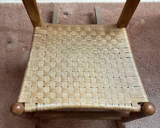 H18 - $30. Shaker Style Ladderback Rocking Chair. Measures 16.5" x 17" x 32"T, floor to seat 15.75"T. Some surface wear, but structurally sound.