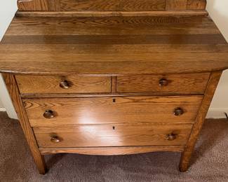 H14 - $125. Antique Oak Full Sized Dresser With Harp Mirror. Measures 38" x 19" x 66.5"T, floor to dresser top- 33.5"T. Very good condition.