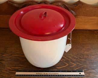 H68 - $20. Enameled pot with lid.
