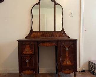 H23 - $85. Antique Art Deco Vanity With Arched Triple Mirror. Measures 40" x 17.25" x 66"T, floor to vanity top 30"T.