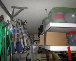 folding outdoor chairs, hoses, more boxes
