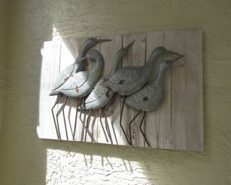 metal sandpipers on wood hanging wall art