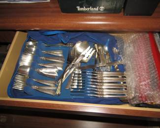 older flatware set in wood box
