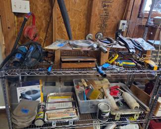 Paint, paintbrushes, paint pans, paint rollers