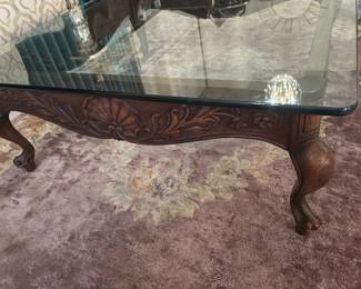 Fantastic Deal!  Carved French Provincial Square Glass Coffee Table $175  Elegant scalloped apron framework showcasing a centered hand-carved floral fan motif. Inset heavy tempered glass top allows an unobstructed view of statement flooring beneath. Finished with classic cabriole legs for 