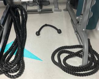 Premium Strength Conditioning Kit (Heavy Battle Ropes & Tricep Rope) high-density poly-dacron Heavy Battle Rope. Equipped with reinforced heat-shrink handles to prevent fraying and ensure a secure grip during high-intensity intervals. This athletic training kit also includes a commercial-grade, heavy-duty braided nylon Tricep Pulley Rope attachment with oversized solid rubber end-caps.