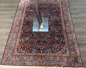Fine Hand-Knotted Persian Isfahan / Tabriz Accent Rug Intricate perfection on a compact canvas. This exceptional, high-grade hand-knotted Persian accent rug showcases jaw-dropping precision in its scrolling botanical vine-work. The dense midnight blue field is masterfully balanced by a soft dusty rose border filled with delicate palmette motifs. A pristine, versatile collector's textile ideal for a high-end entry, executive hearth, or luxury dressing suite anchor.