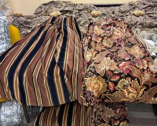The Custom Designer Drapery Collection Instantly elevate your architecture. This exclusive collection of custom, designer-fabricated drapery panels features uncompromising showroom quality. Crafted from ultra-heavyweight textiles, the collection includes dramatic deep eggplant silk-velvet panels, stately Renaissance-style floral jacquards paired with coordinating bold striped velvets, and elegant shimmering icy blue-silver damask pairs. Completed with weighted hems, professional lining, and included luxury bullion tassel tie-backs, these pieces offer thousands of dollars in custom fabrication value ready to install.