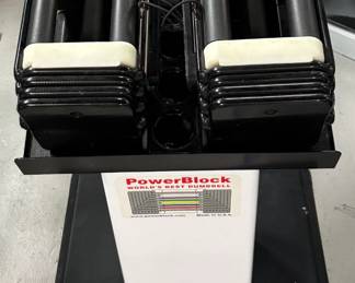 Vintage PowerBlock Pro Rexan Heavy Adjustable Dumbbell Set (12.5-125 lbs.) with PowerStand: This specific set is an iconic, older Made in the USA model. It features precision-milled steel weight blocks and structural welded side rails. Unlike standard retail sets that stop at 50 or 90 pounds, this is an ultra-heavy commercial set that ranges from 12.5 lbs. all the way up to 125 lbs. per hand. Home gym enthusiasts widely consider the Pro Rexan seres to be among the finest and most durable adjustable weights ever manufactured.