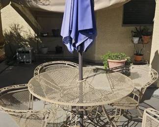 Metal Table, Four Matching Chairs and a Table Umbrella